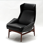 Winged armchair