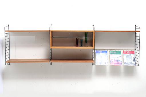 Wall shelf system by Nisse Strinning