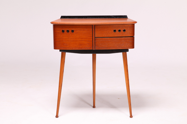 Small chest in teak with three swivelling drawers