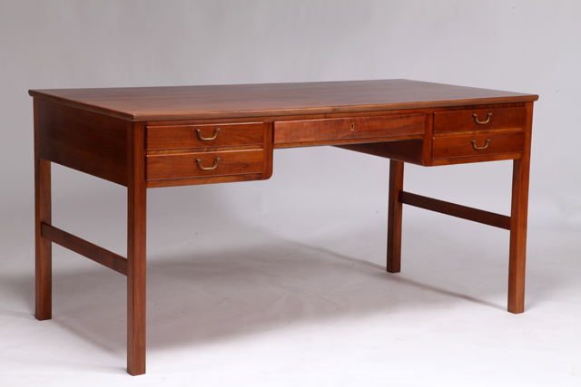 Desk in walnut by Ole Wanscher