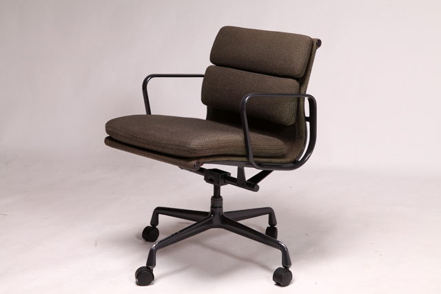 Soft pad chair by Charles and Ray Eames