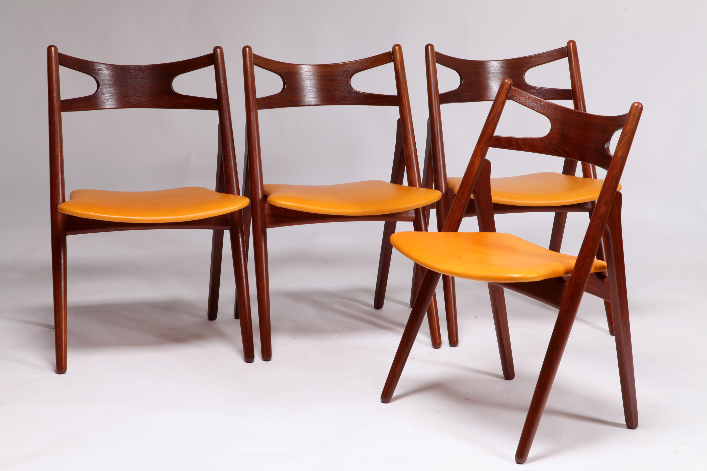 Model CH29 Sawbuck chair in teak by Hans J. Wegner | Swanky Systems