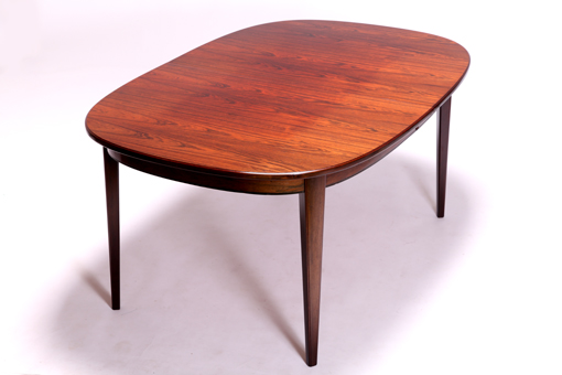 Rosewood dining table with 1 extra leaf by Omann Junior