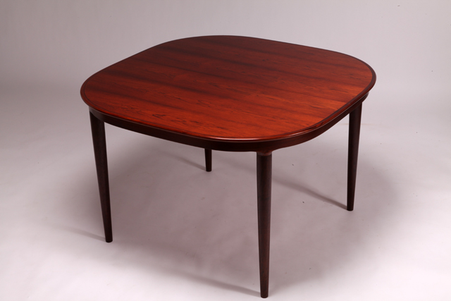 Dining table in rosewood with 2 extra leaves by Kai Kristiansen