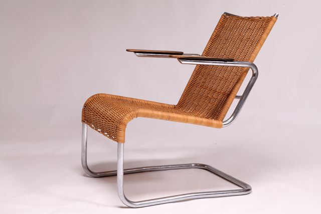 Tubular frame with rattan armchair by Arie Verbeek