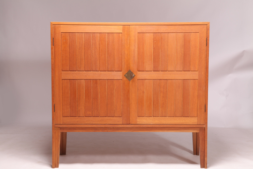 Tall sideboard in solid oak by Kurt Østervig