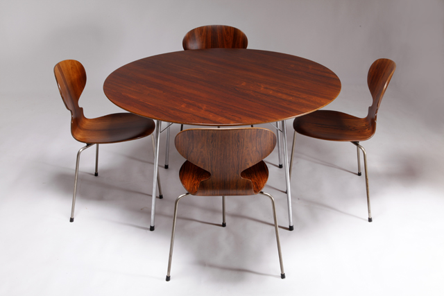 A circular dining table & set of four “Ant chairs”  in rosewood by Arne Jacobsen