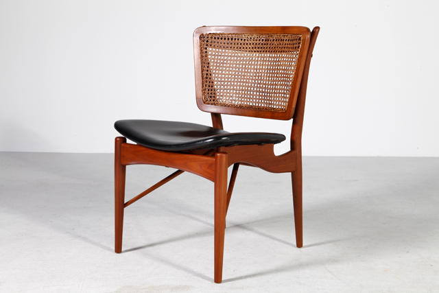 NV51 in teak and cane by Finn Juhl