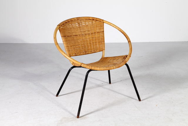Round woven cane lounge chair