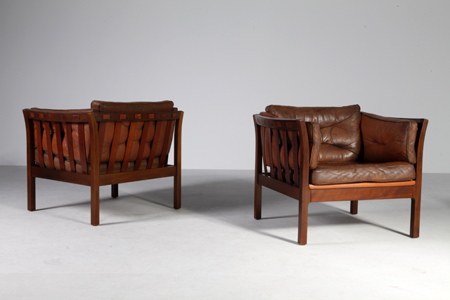 Pair of danish chairs with core-leather strops and patinated leather pillows